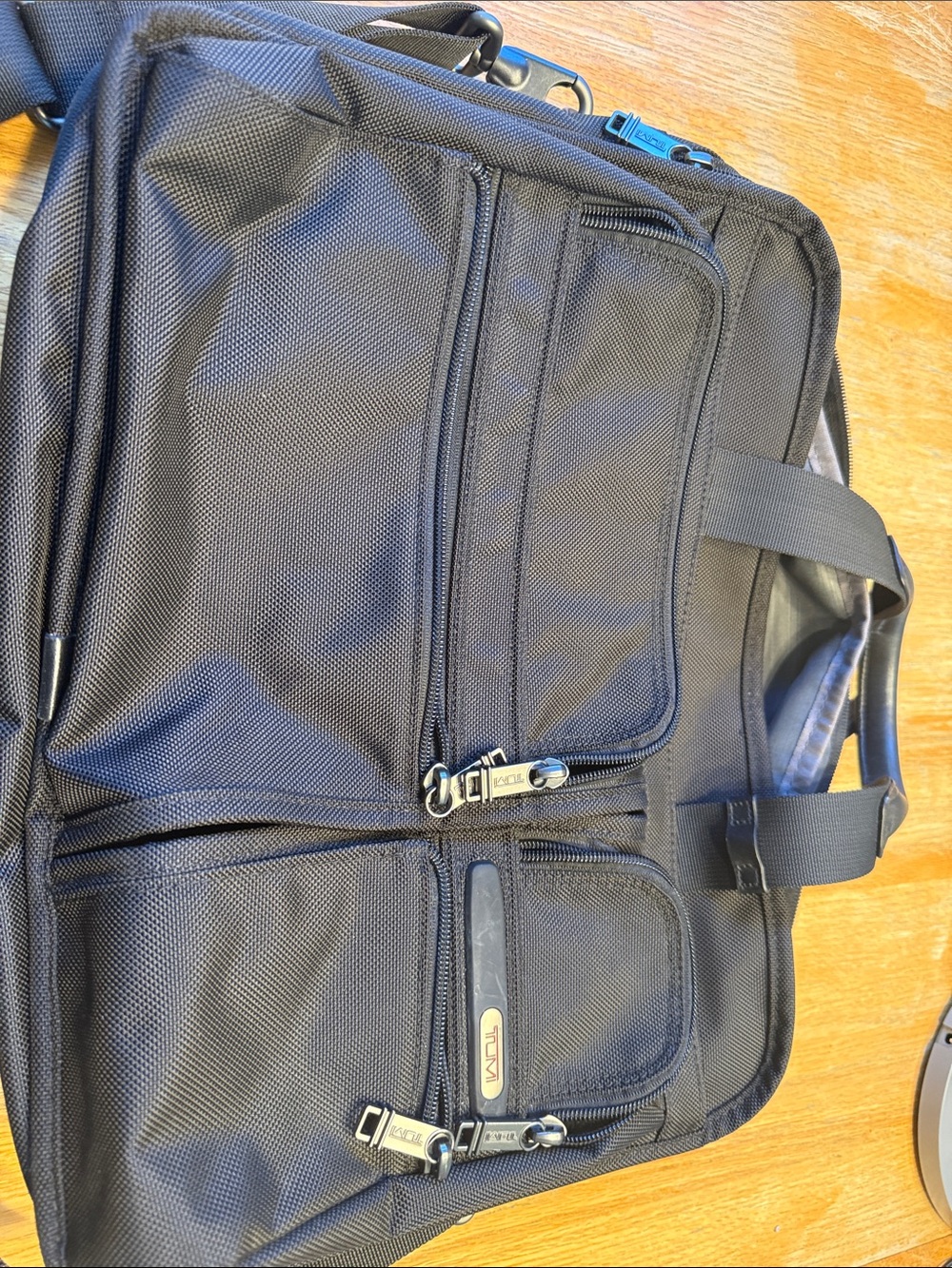 This Tumi Alpha black ballistic nylon expandable laptop business briefcase